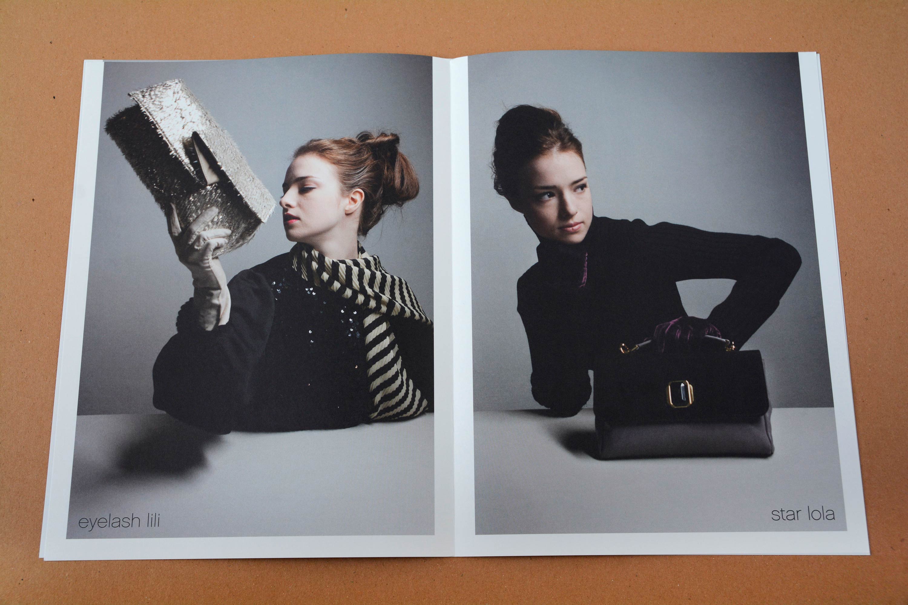 Double page. Full-page photos with partly white space around. Women at a white table holding handbags in front of neutral background. Thin grotesque font overlayed at bottom.