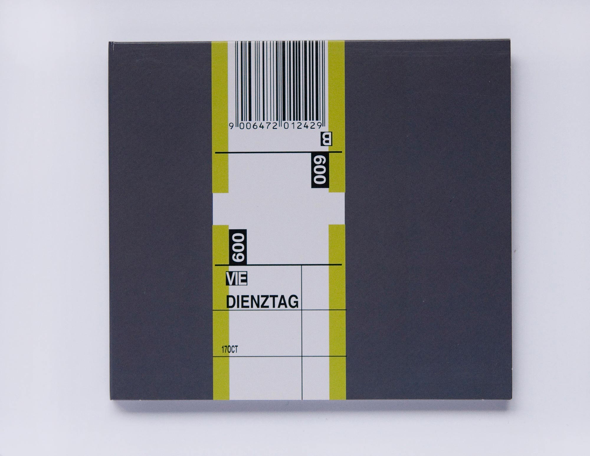 CD cover with graphical elements resembling luggage tag. Title is incoporated.