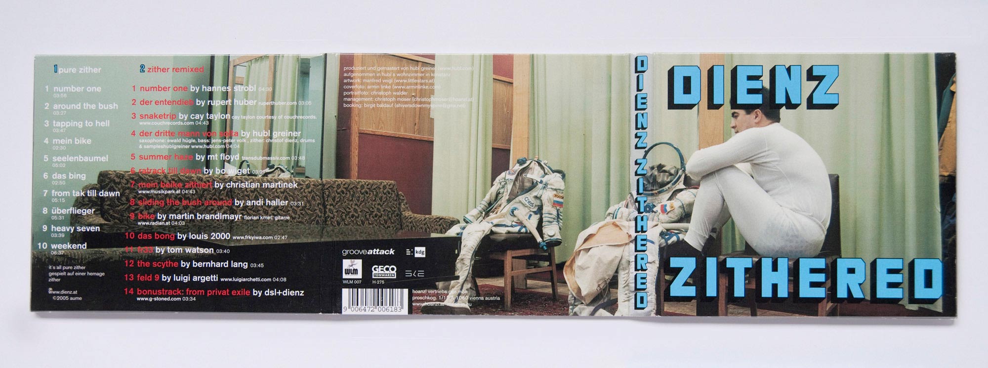 Unfolded CD packaging. Photo of man in undergarment sitting in a room beside his taken-off space suit. Text and title are overlayed.
