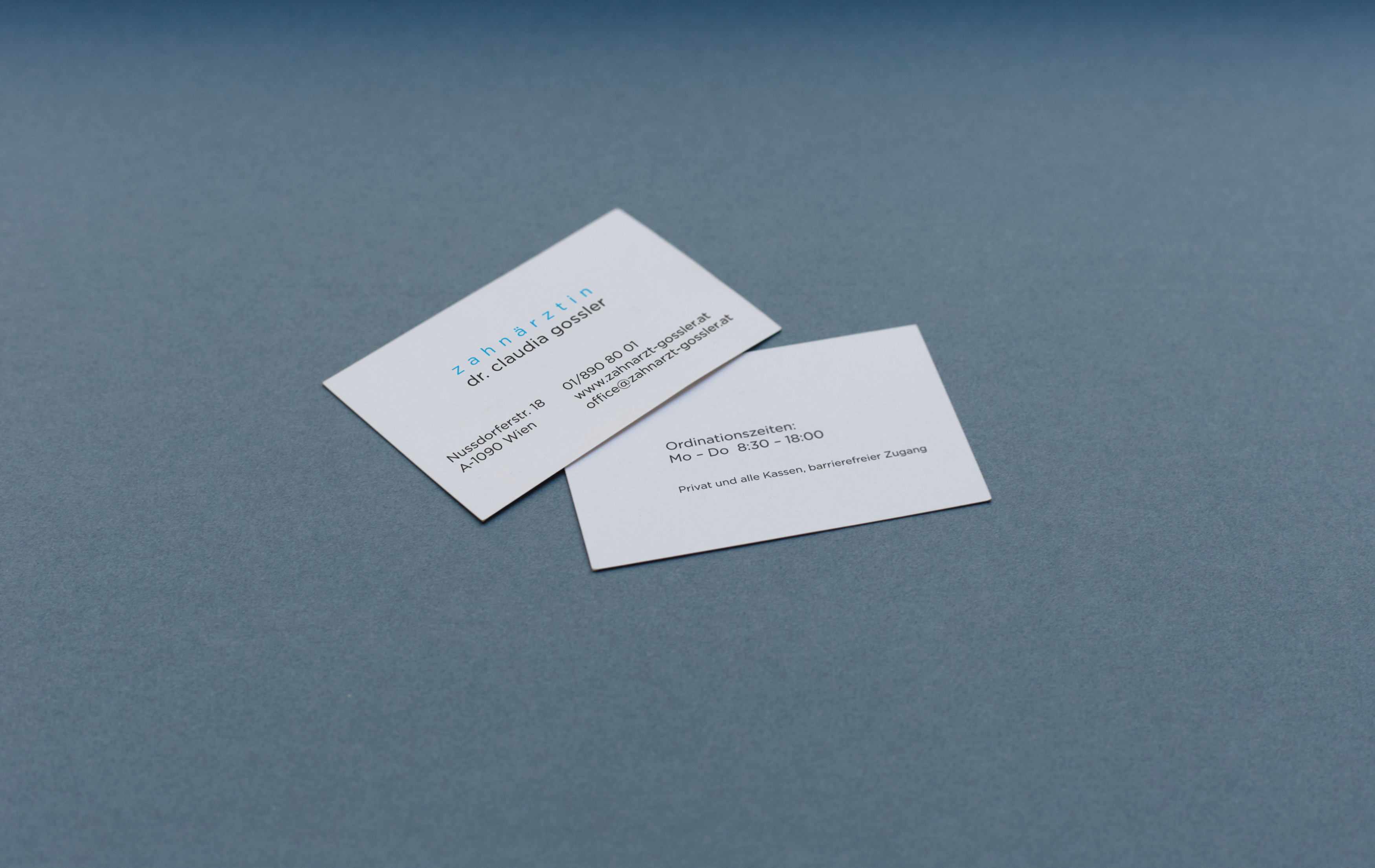 Front and backside of businesscard.