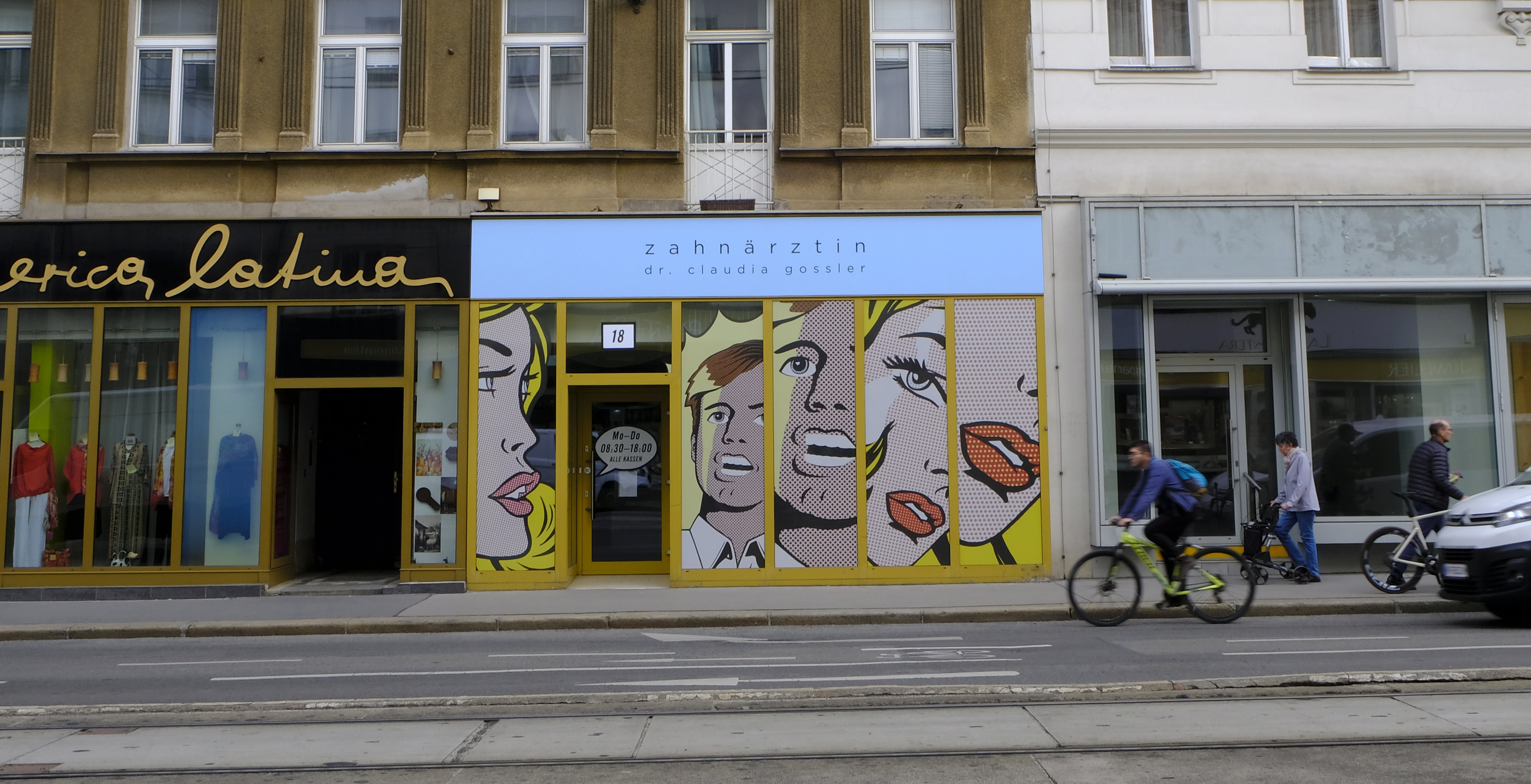 Full facade seen from opposite side of the street.