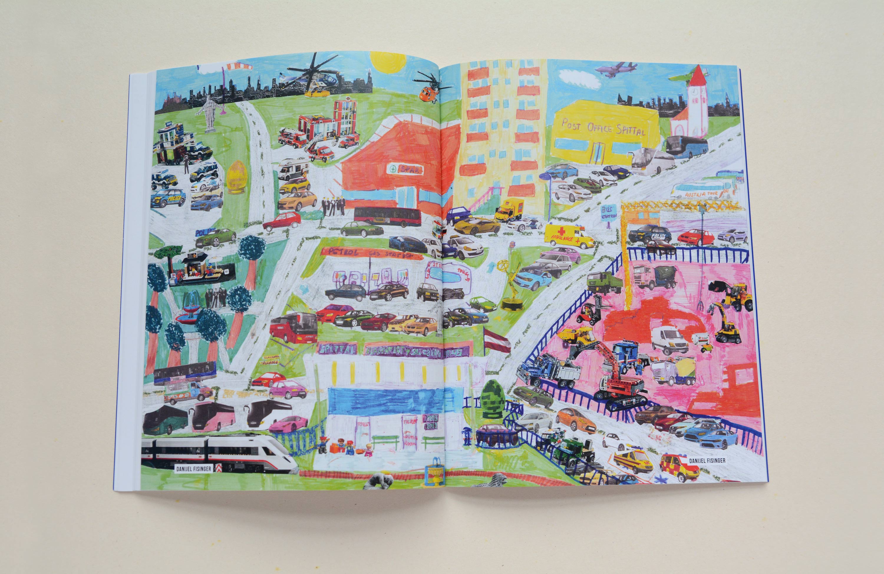 Double page. Illustration of city over 2 pages. Collage of drawing and cutted photos.