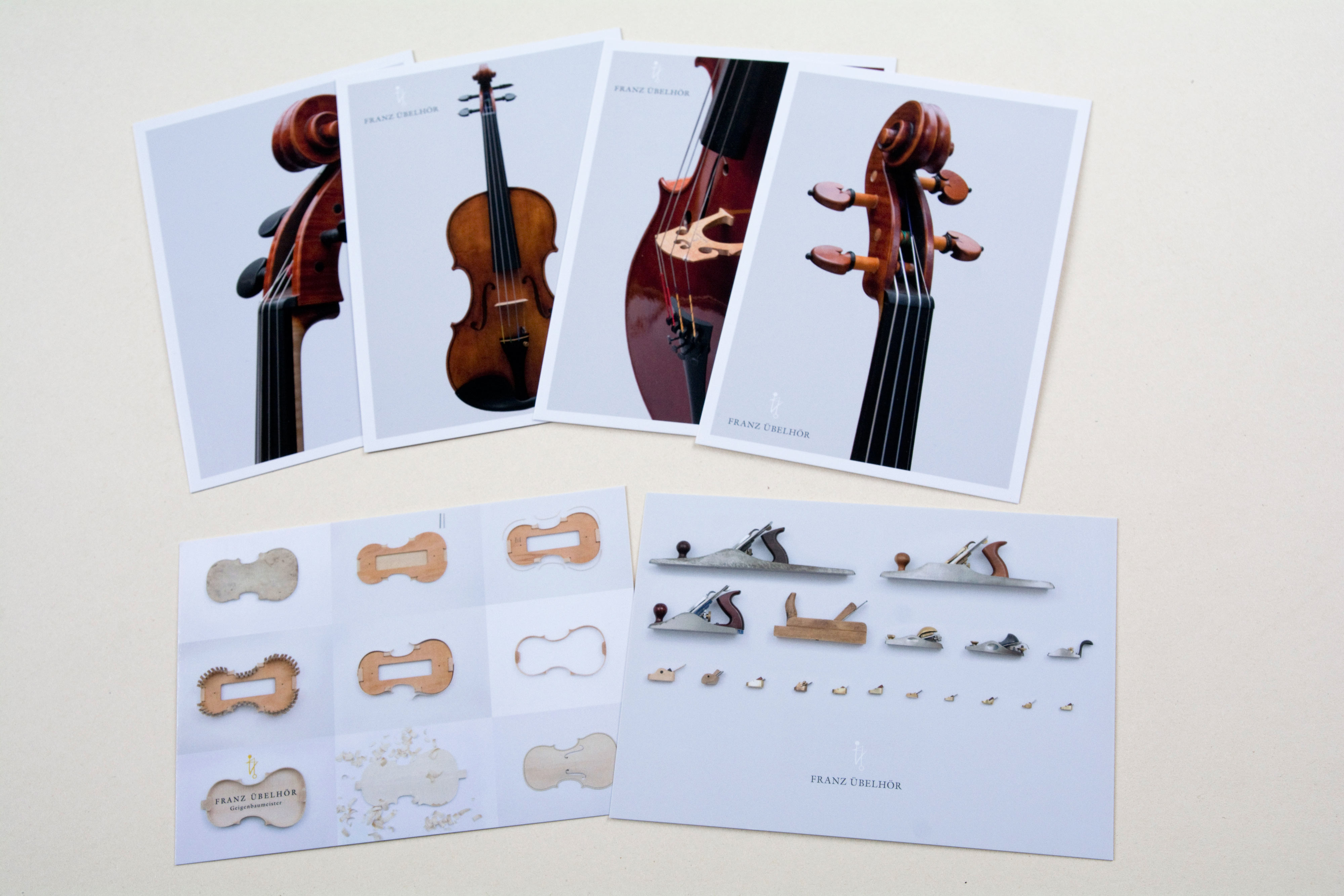 Several postcards with photos of instruments and tools. Logo is incorporated.
