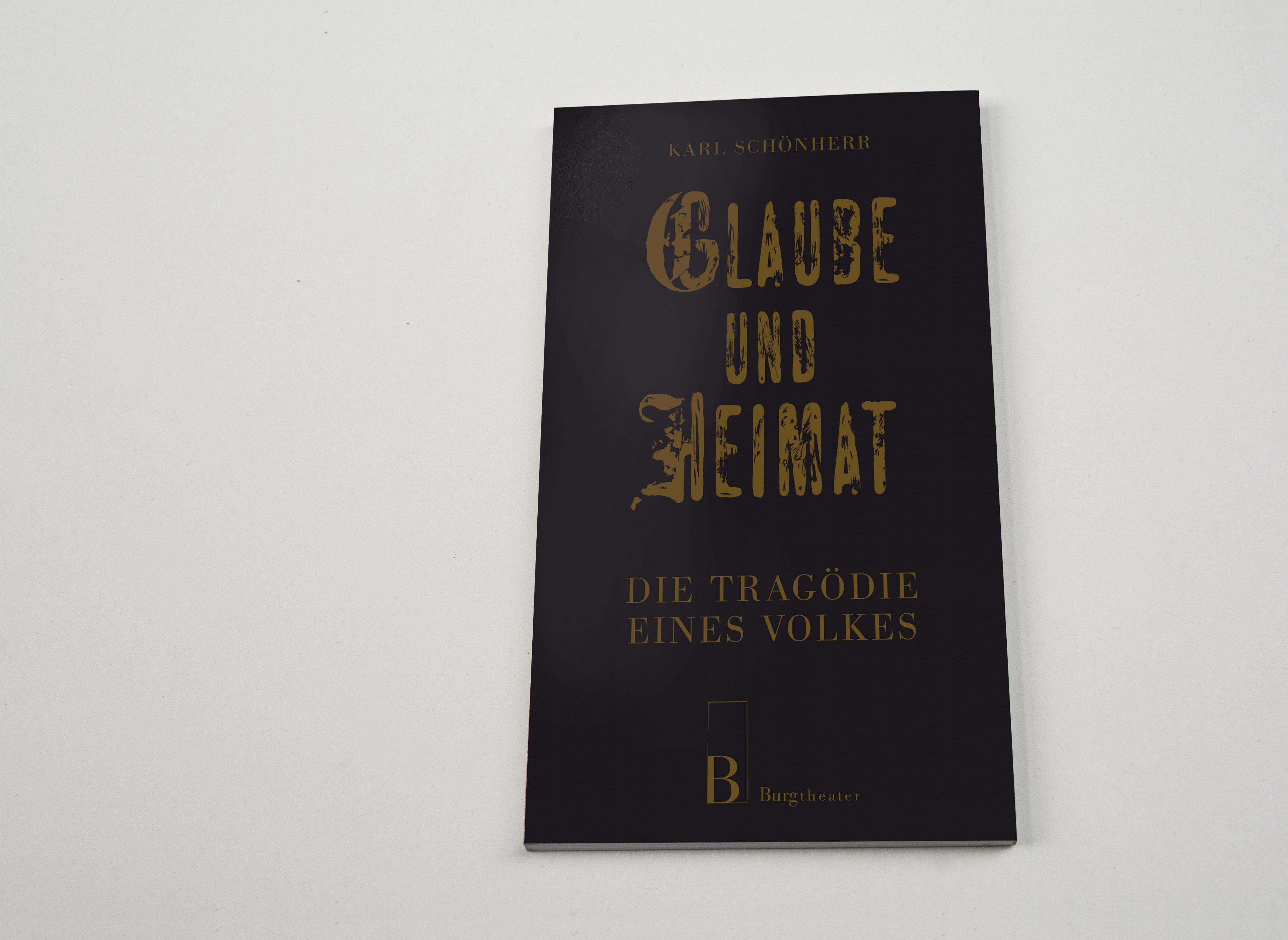 Booklet cover. Distressed title font in Gold on black background. Subtitle in golden font underneath.