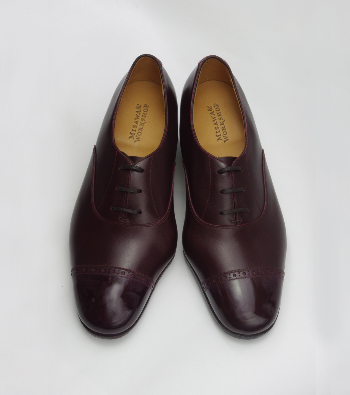 Leather shoes for woman. Brand stamped logo on insoles.