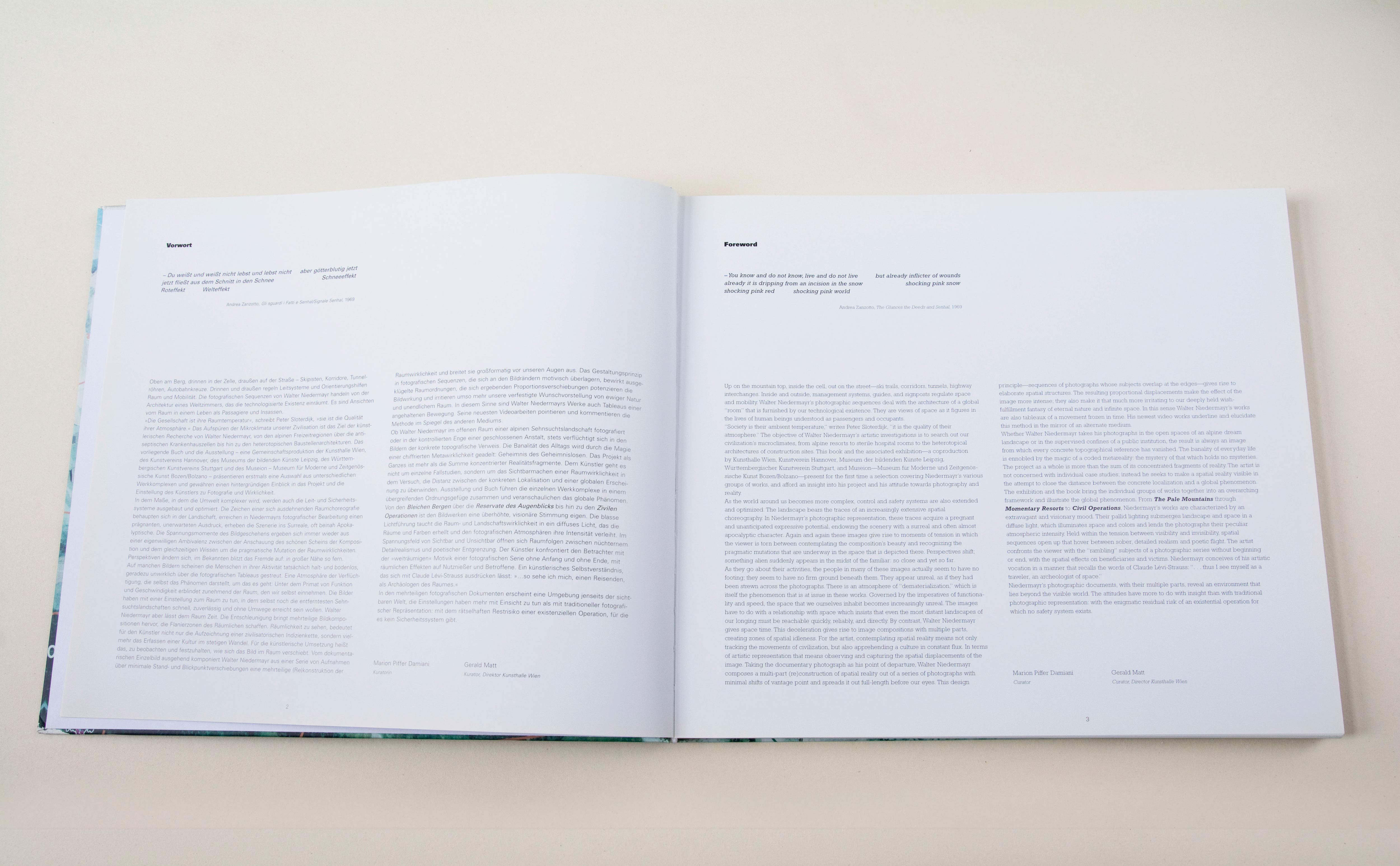 Double page. Small headline on top of each page. Blocks of Text underneath.
