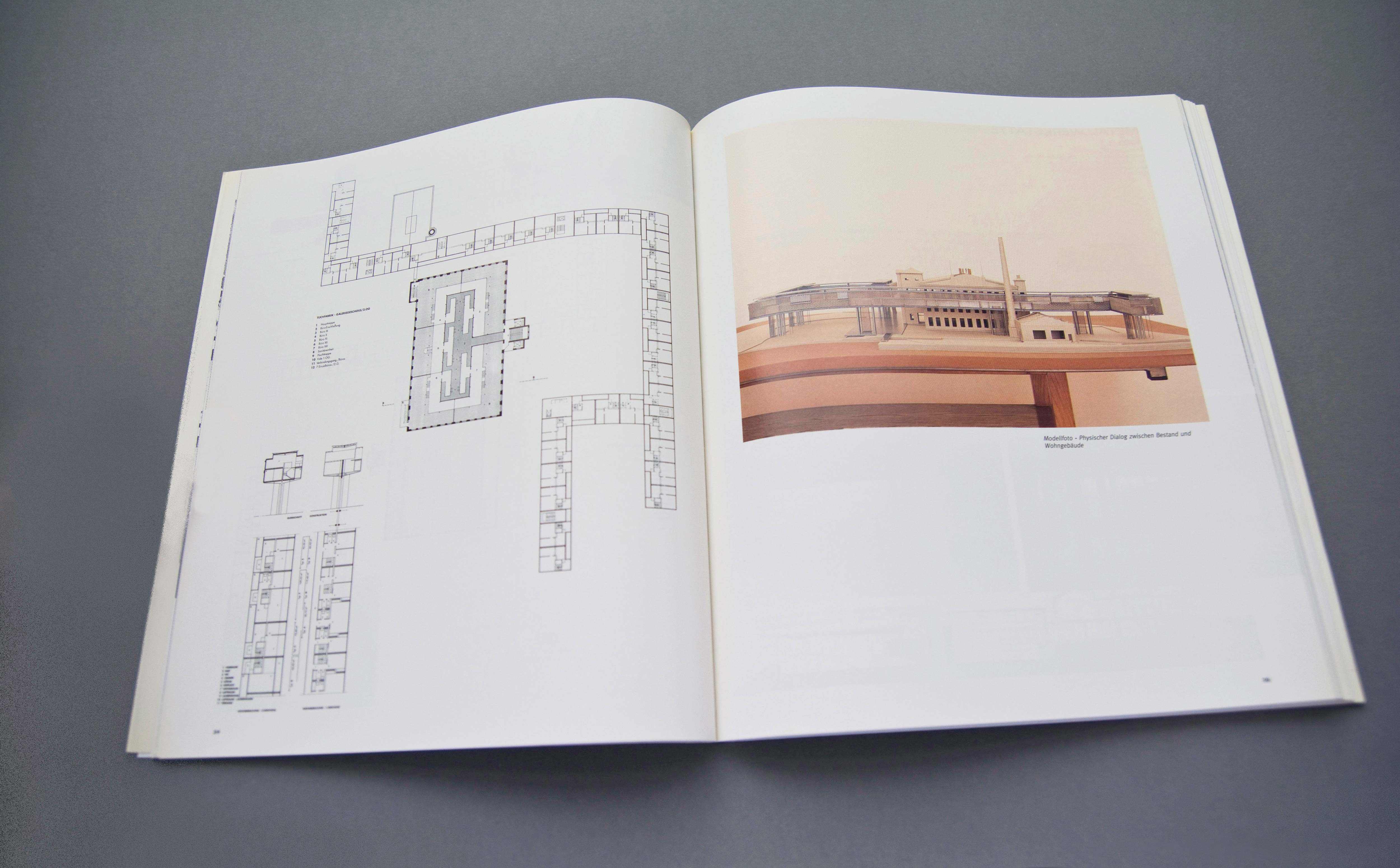 Double page. Left: Full-page floor plan. Right: Photo of architectural model.