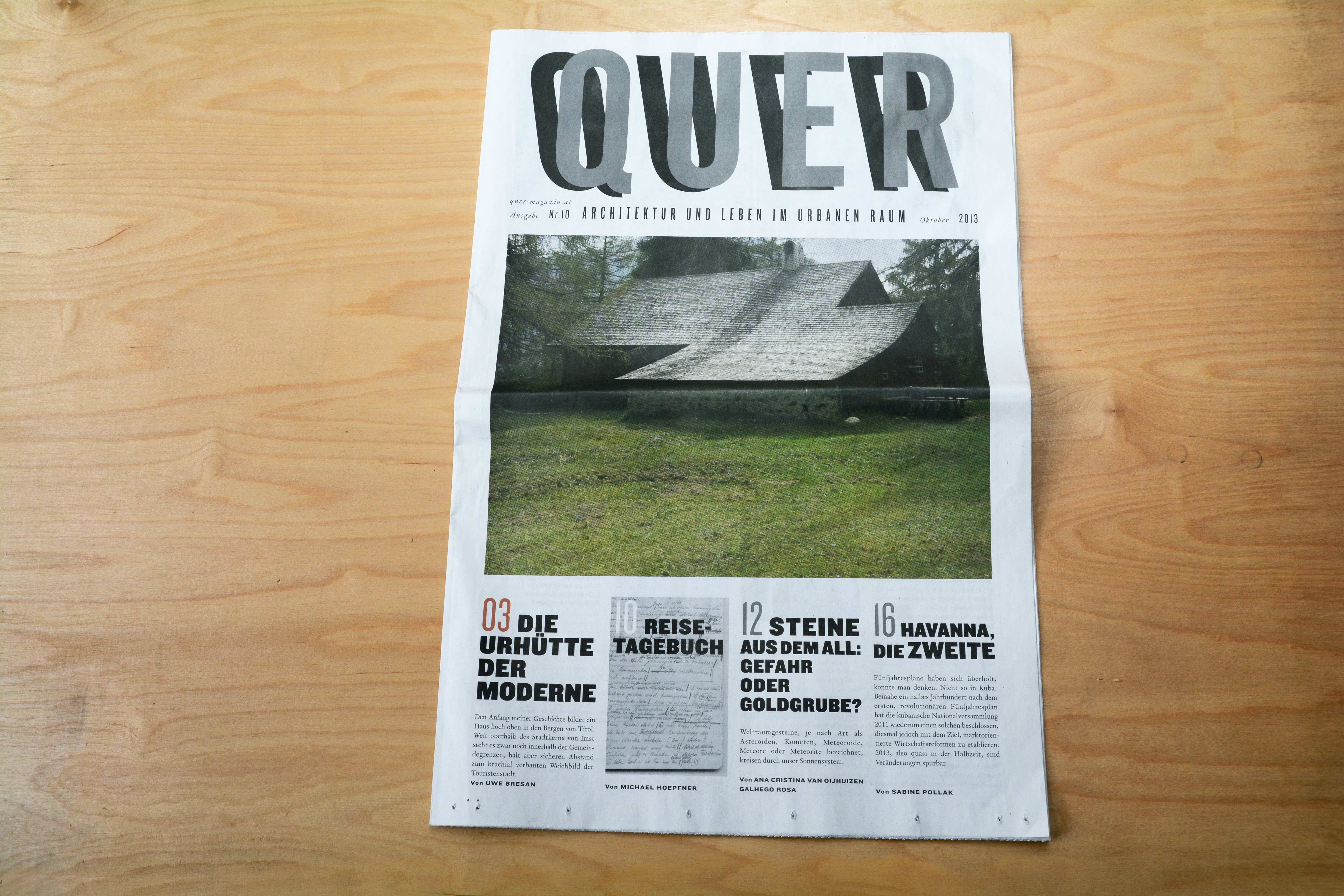 Cover newspaper. Header with large logo in upper third. Underneath lead photo. In lower third 4 columns with Headlines in various font sizes and block of small text underneath. 1 column has background image.