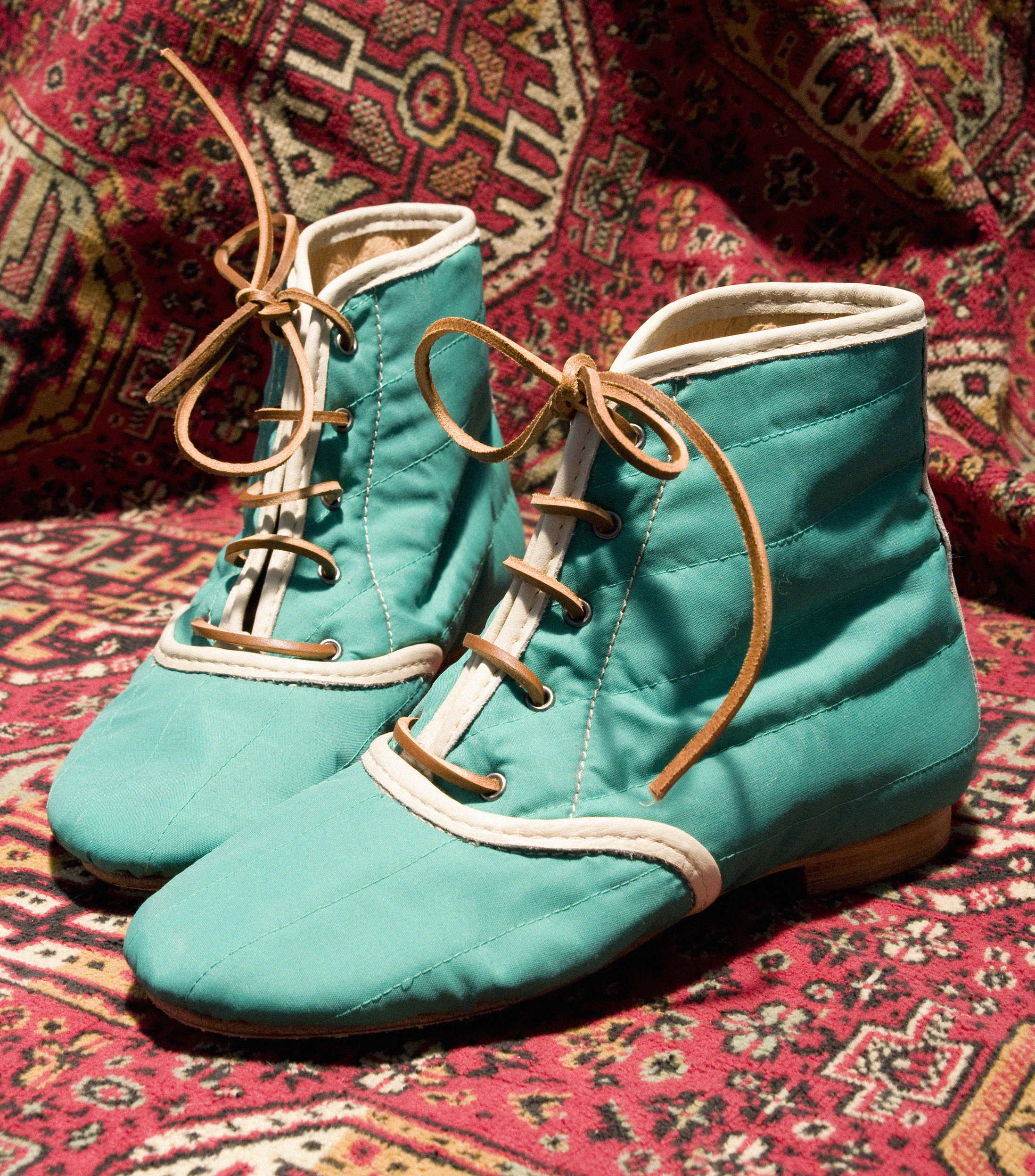 Photo of pair of shoes on fabric.