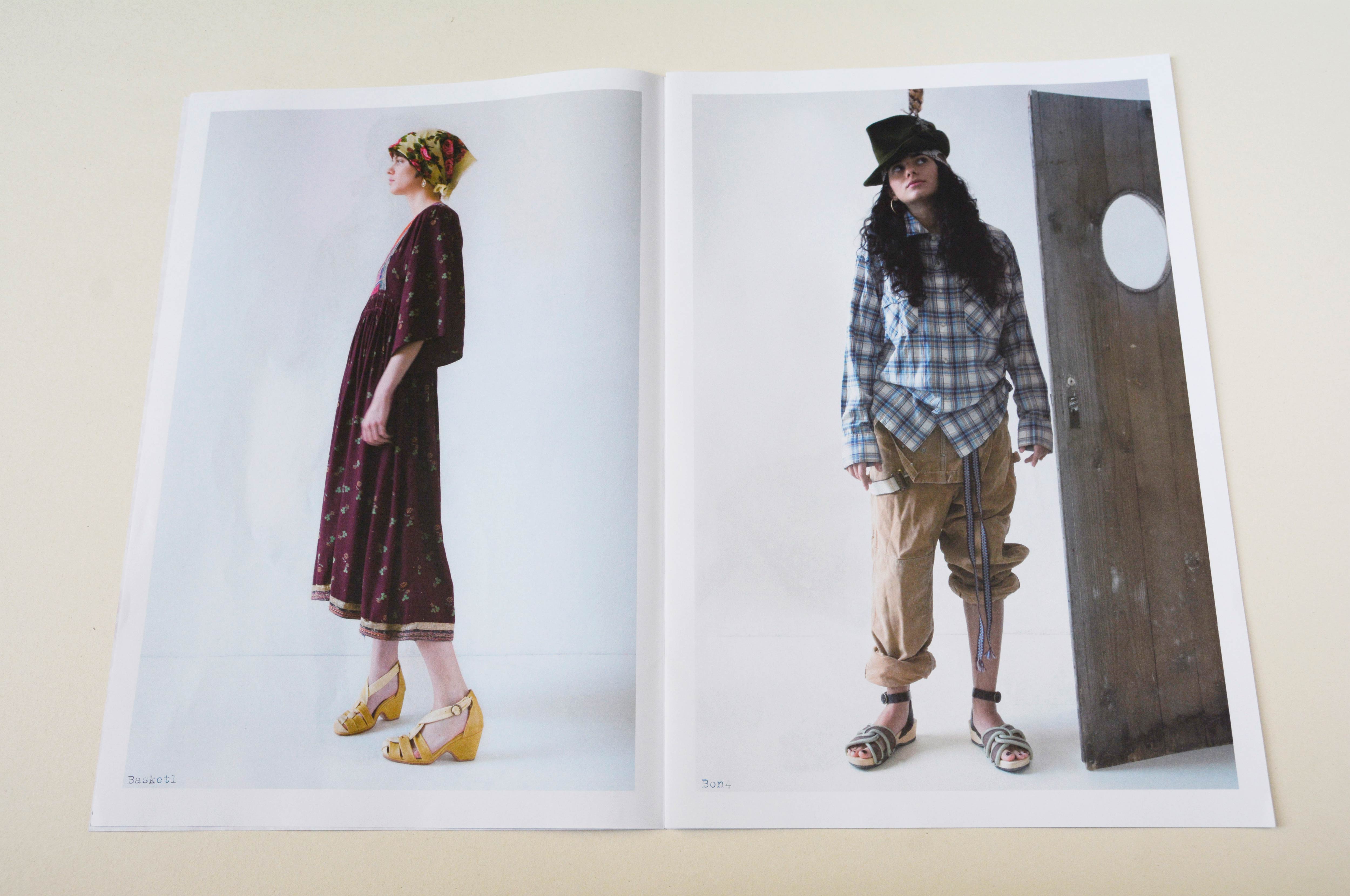 Double page showing large photos. Small font overlayed at bottom. Left: Woman standing in front of neutral background. Right: Woman standing beside wooden door in front of neutral background.