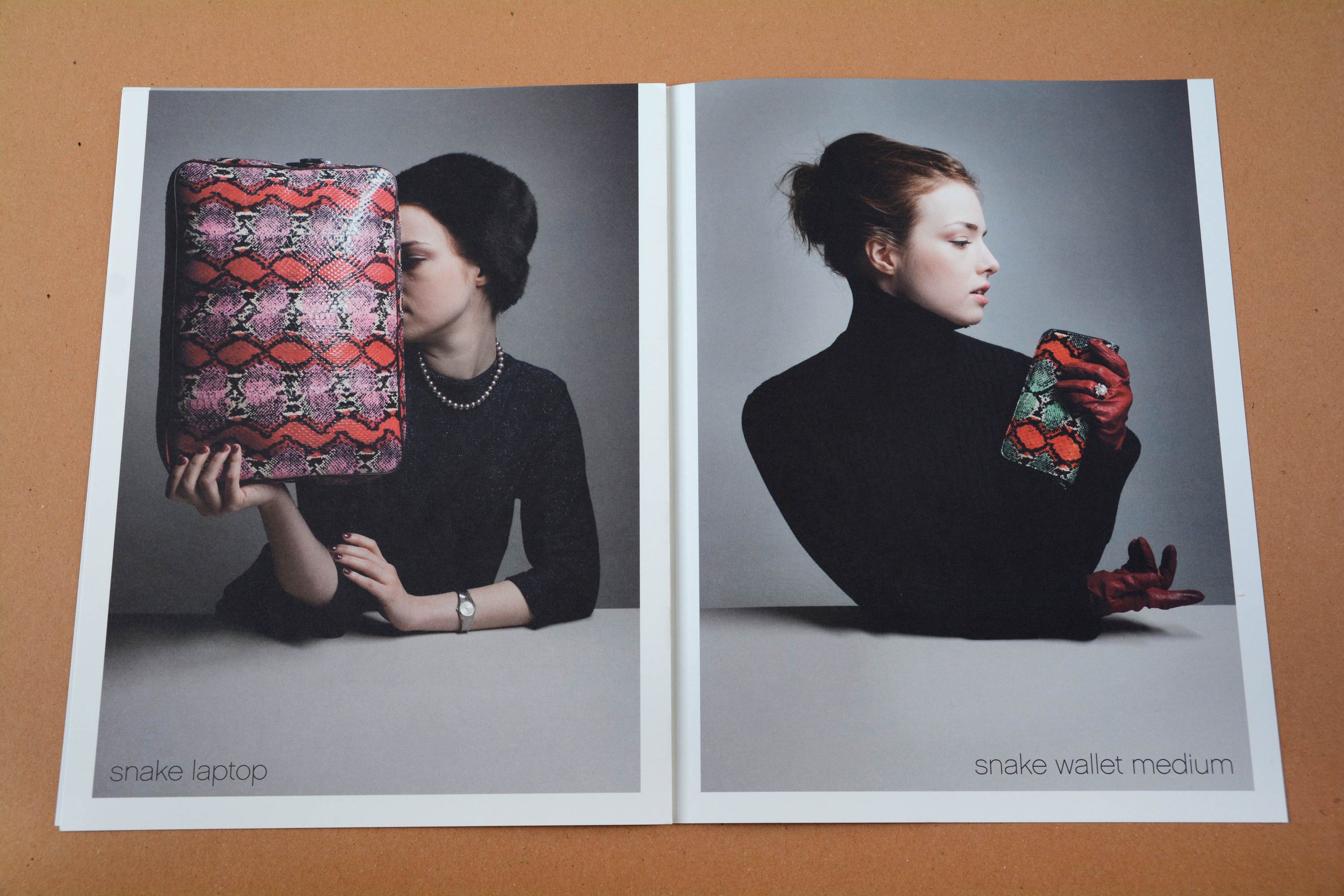 Double page. Full-page photos with partly white space around. Women at a white table holding handbags in front of neutral background. Thin grotesque font overlayed at bottom.